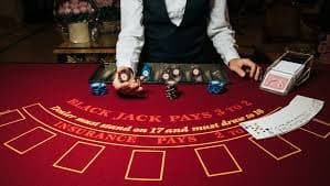 Live blackjack dealer broadcasting from studio on 18toto wap mobile app